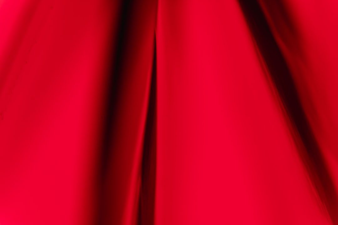 A close up of a red satin fabric